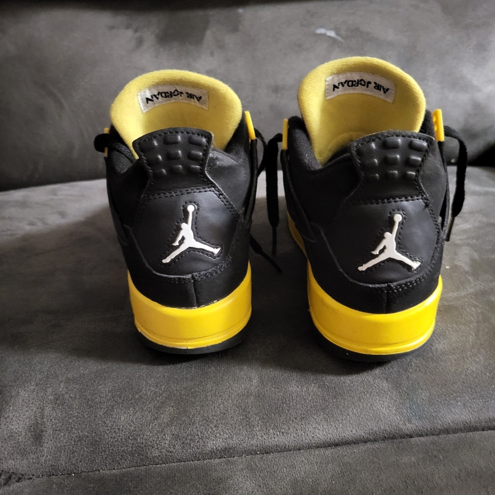 Black and Yellow Jordan 4s size 4y